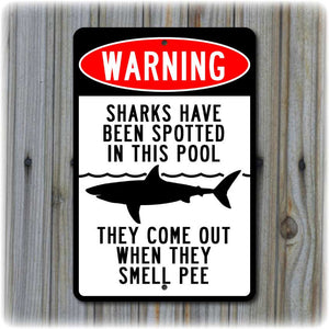 Warning: Sharks Have Been Spotted In This Pool Sign